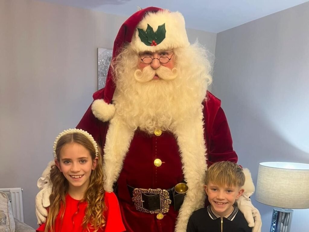 Magic Santa with two of his regular clients